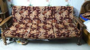 Red, Brown, And Black Floral Fabric Sofa