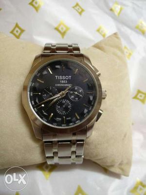 Round Silver And Black Tissot  Chronograph Watch With