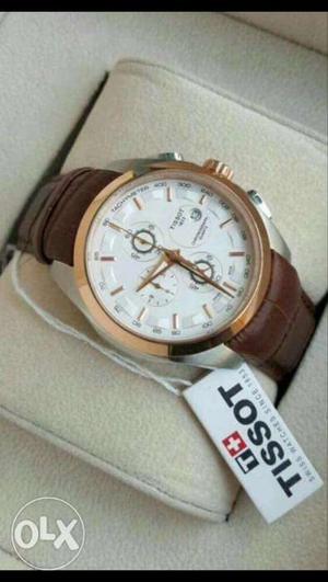 Round White Tissot Chronograph Watch With Brown Leather