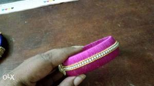 Single pink coloured party wear bangle rounded