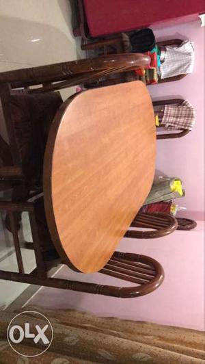 Teakwood base with 6 dining chairs