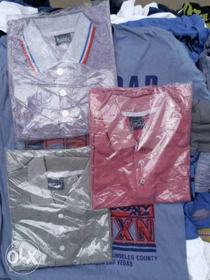 Three Gray, Pink, And Space Dye Purple Polo Shirts