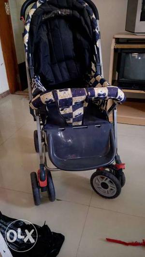 Toddler's Blue And White Umbrella Stroller