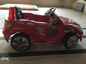 Toddler's Red And Grey Ride On Toy Car
