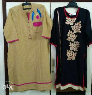 Two Black And Brown Traditional Tops