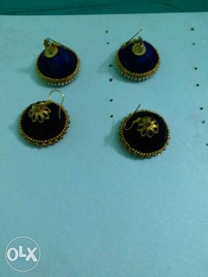 Two Pairs Of Black-and-gold Jhumka Earrings