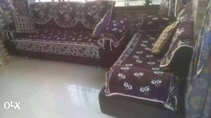 Two Purple And White Floral Fabric Couch Cover Set