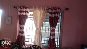 Two Red Window Curtains