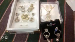 Unused jewellery combo including three ear rings,