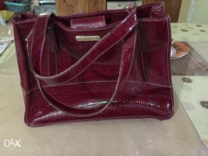 Very little used women's hand bag at a very reasonable price