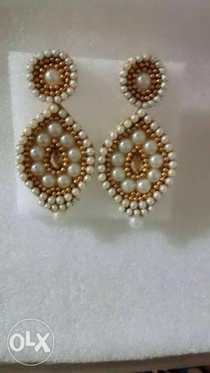 White pearl earrings one pair