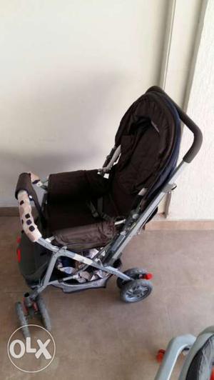 Baby's Black And Silver Stroller