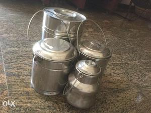 Four steel dabbas sparingly used