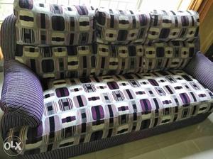 Purple And Brown Padded Sofa