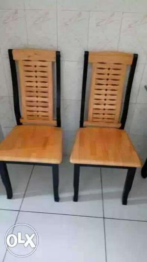Two Brown-and-black Wooden Chairs
