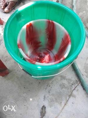 Two White-and-red And Green Plastic Buckets