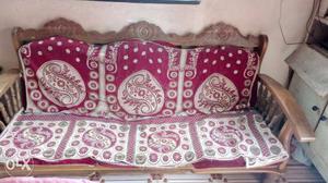 White, Red, And Grey Floral Padded Brown Wooden Sofa