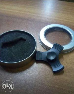 Black Tri-spinner Fidget With Round Silver Case