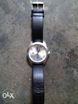 Fastrack watch with black leather strap and is 3 months old