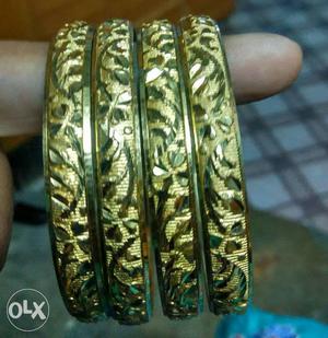 Four Gold Steel Bracelets
