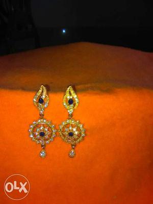 Gold plated ear rings with blue and white stones