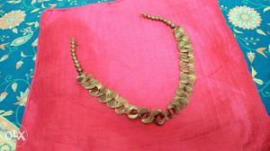 Golden necklace which we can wear with western