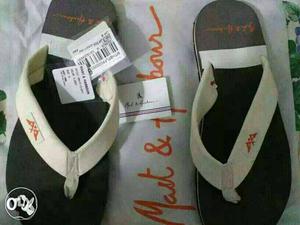 Pair Of White-black Sandals