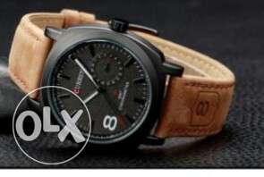 Round Black Chronograph Watch With Brown Leather Strap