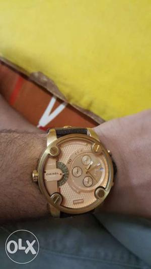 Round Gold Chronograph Watch With Black Leather Bracelet