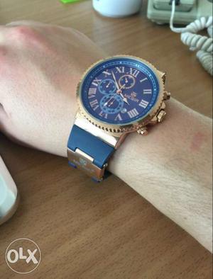 Round Gold Chronograph Watch With Strap
