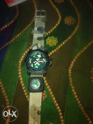 Round Green Faced Chronograph Watch With Green, Black And