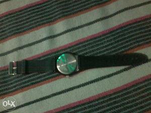 Round Silver Watch With Black Strap
