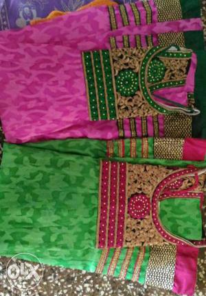 Two Green And Pink Traditional Dresses