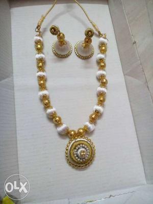 White And Gold-colored Beaded Necklace And Jhumka Earrings