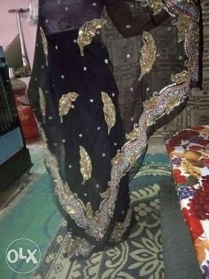 Women's Black And Gold-colored Floral Sari