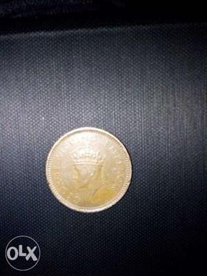 77 year old half rupee king George indian coin
