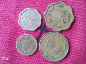 Four Gold Round Coins