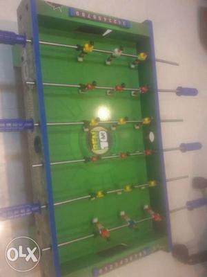 Green And Blue Foosball Table