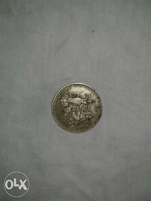 Old and very rear coin it have laxmi and ganesha