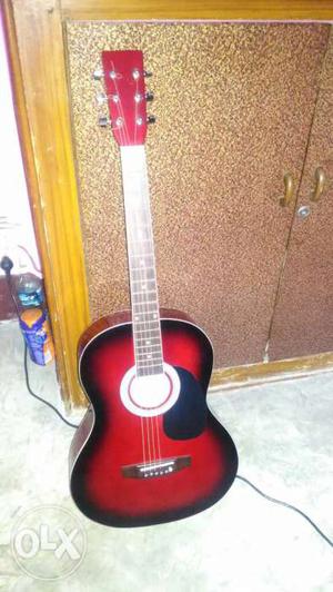 Red beautiful new guitar just 1 month used osam