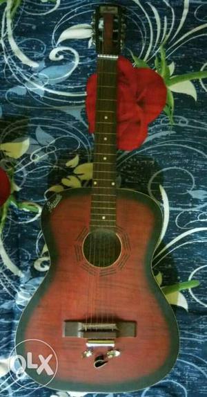 Red hawaiian guitar