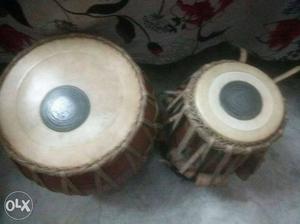 Two Brown Wooden Percussion Instruments
