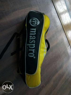 Yellow And Black Masparo badminton kitbag available in