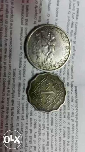  half rupee and  one anna (most valuable