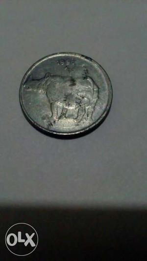  rear 25 paisa coin having a "*" on the back