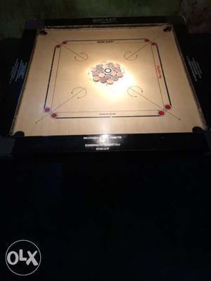 6 month old Carrom board with stand, Pieces,
