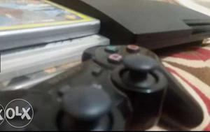 Black ps3 costs  with move controller,eye and dualshock