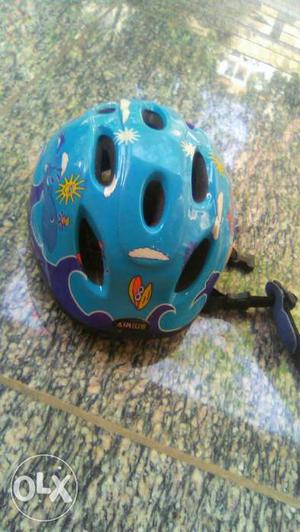 Blue And Purple Bicycle Helmet