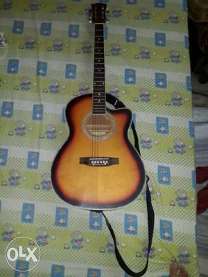 It's a original wooden guitar of spectrum company.dis guitar