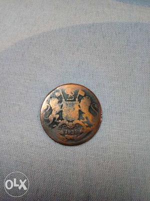 Round bronze coin of year 